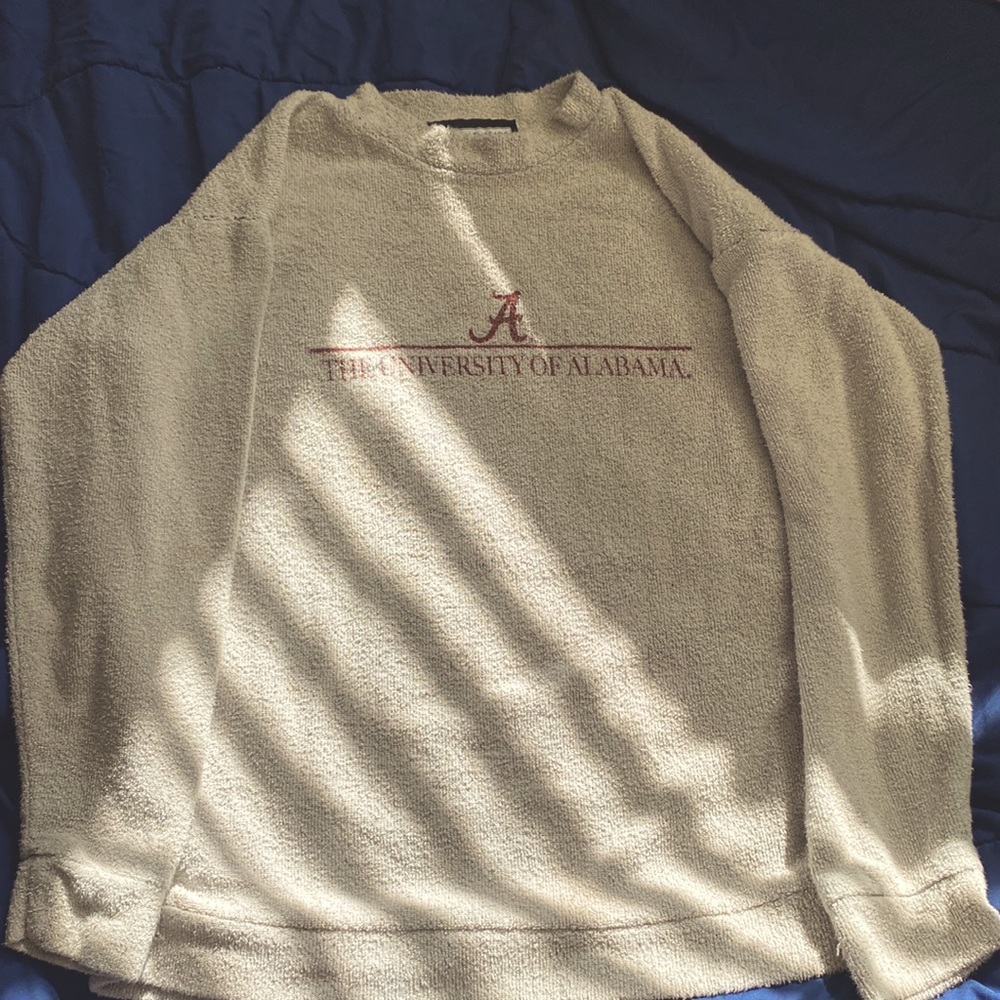 University of Alabama sweatshirt.